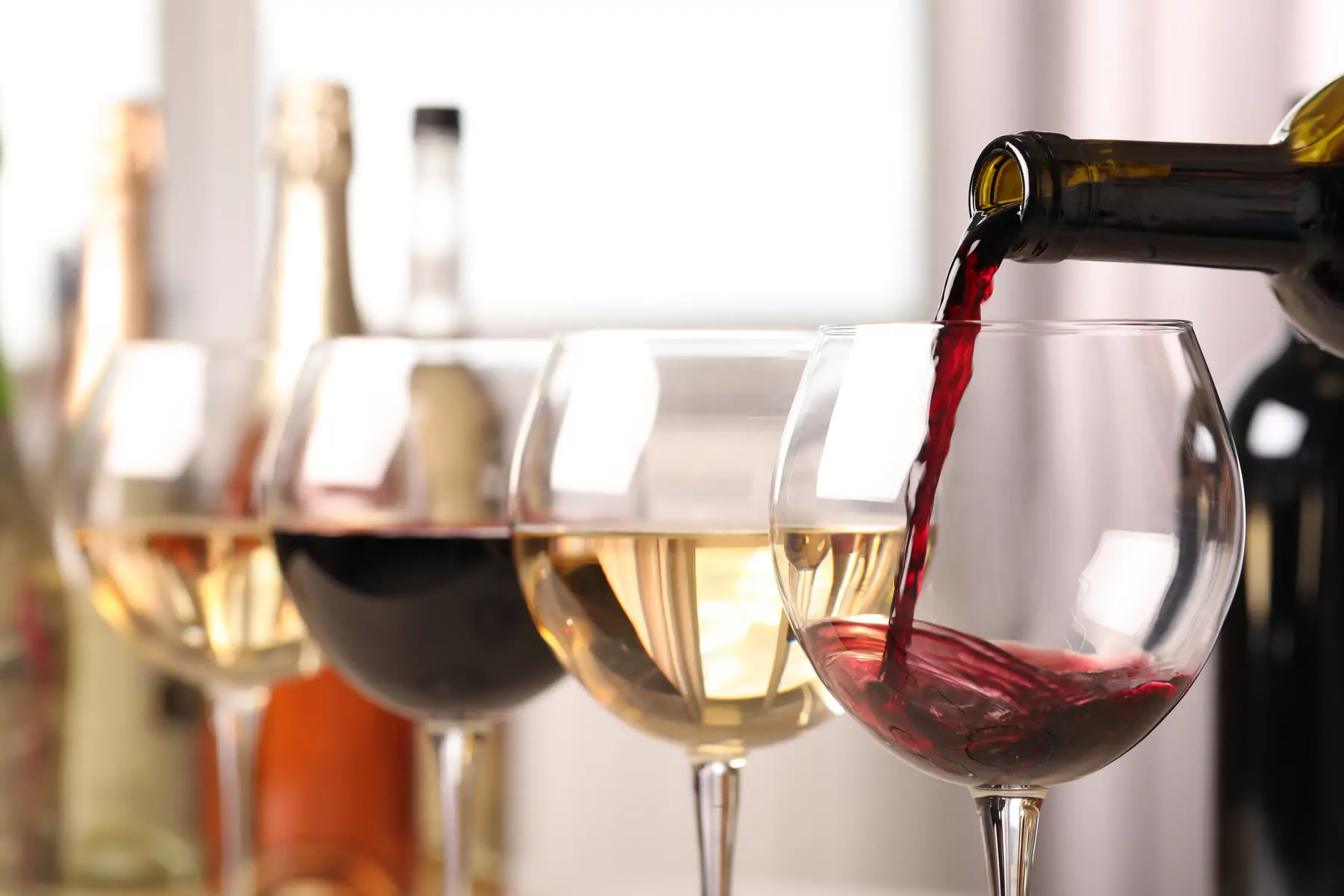 Glasses of red and white wine